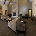 Interior lounge room with chairs and couches